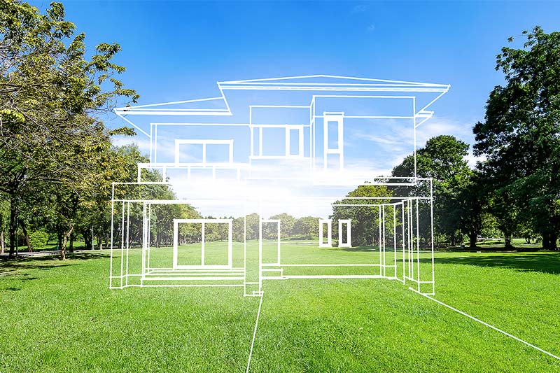 Plot Loans (Concept house on a green grass field)